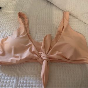 Peach colored Bra top .  Never worn. Nice heavy duty with 18% elasthane.